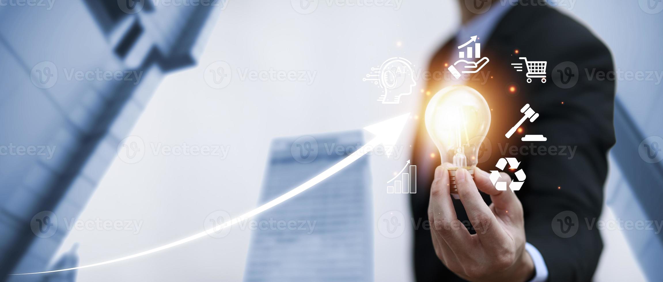 Double exposure of business hand holding light bulb with line connect and working on desk, Creativity and innovation are keys to success.Concept of new idea and innovation with energy and power. photo