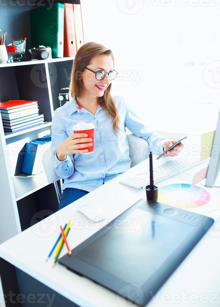 Graphic designer working at the home office - modern business concept photo