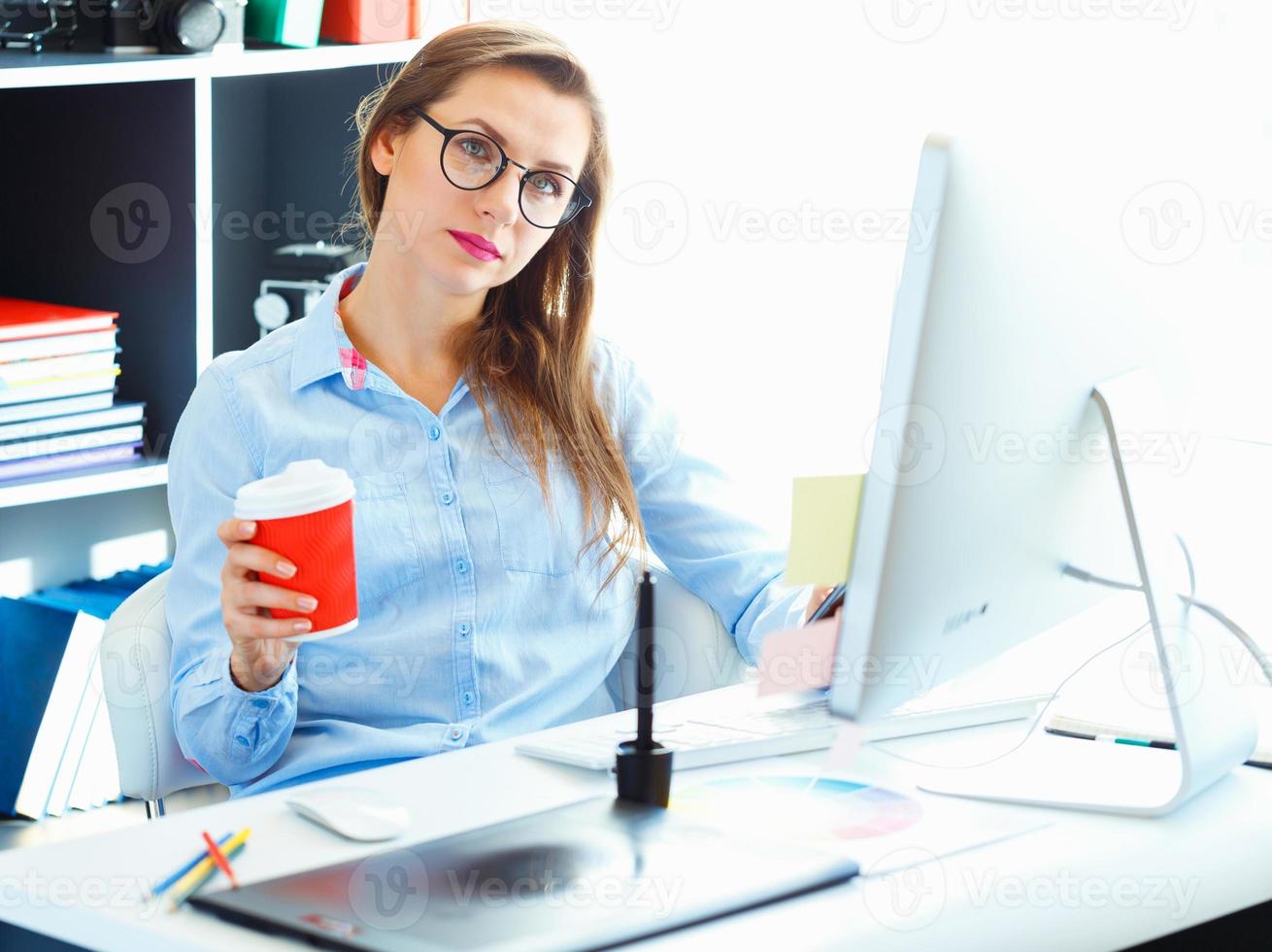 Graphic designer working at the home office - modern business concept photo