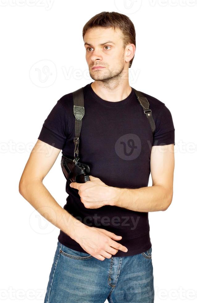 Man with a gun in the holster photo