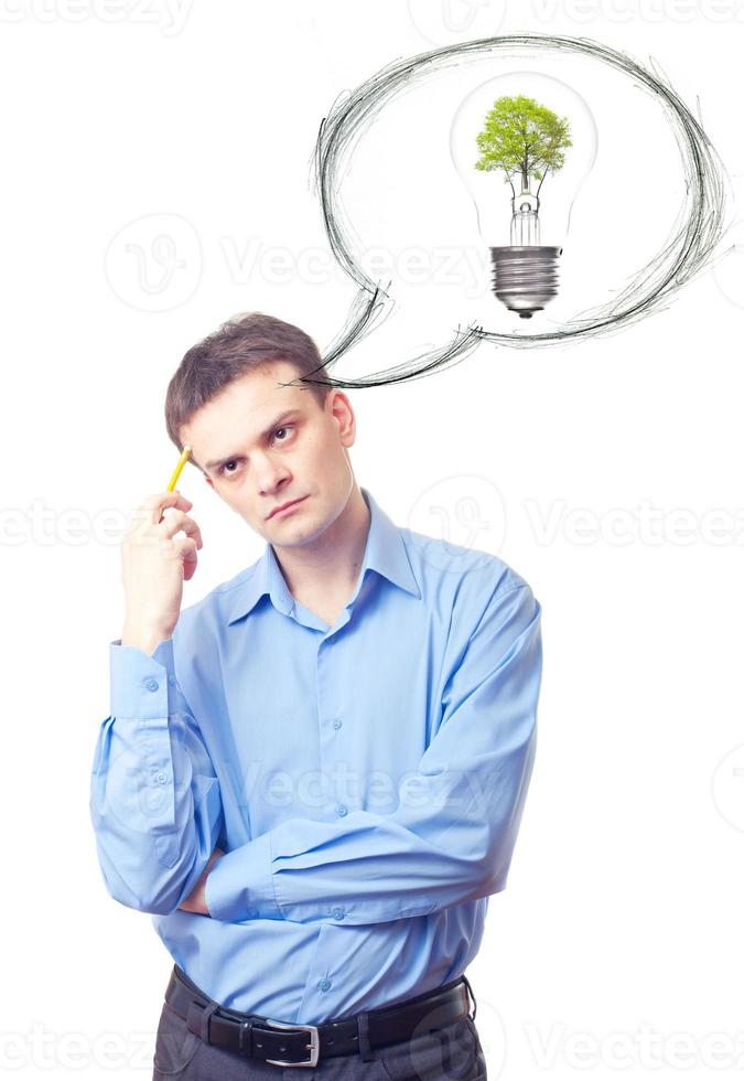 Young businessman lost in thoughts photo