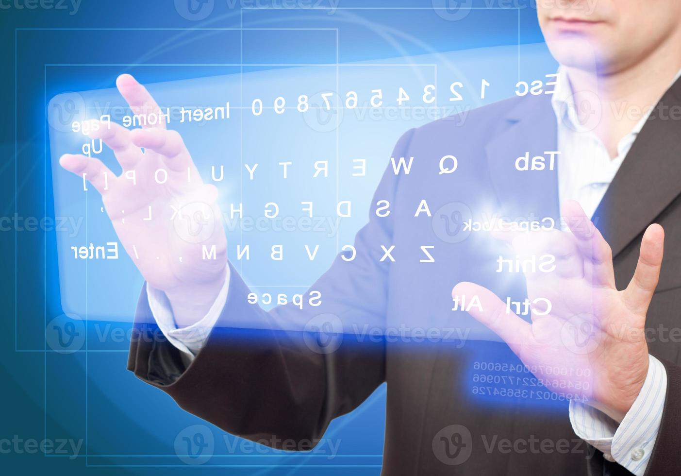 Businessman and Virtual Keyboard. photo