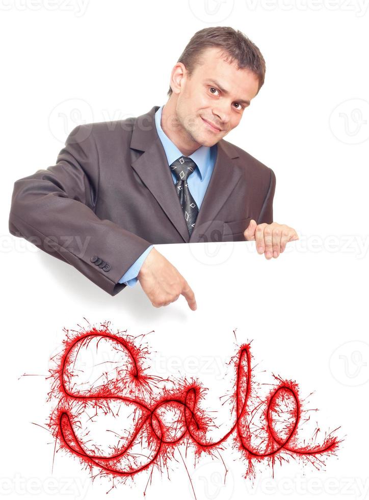 Young businessman points his finger photo