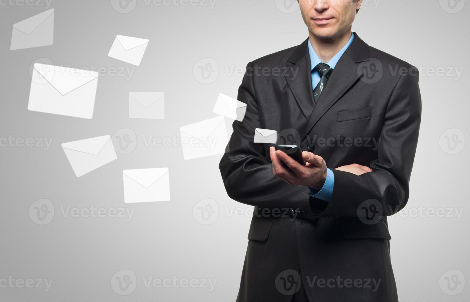 Businessman sends a virtual message photo