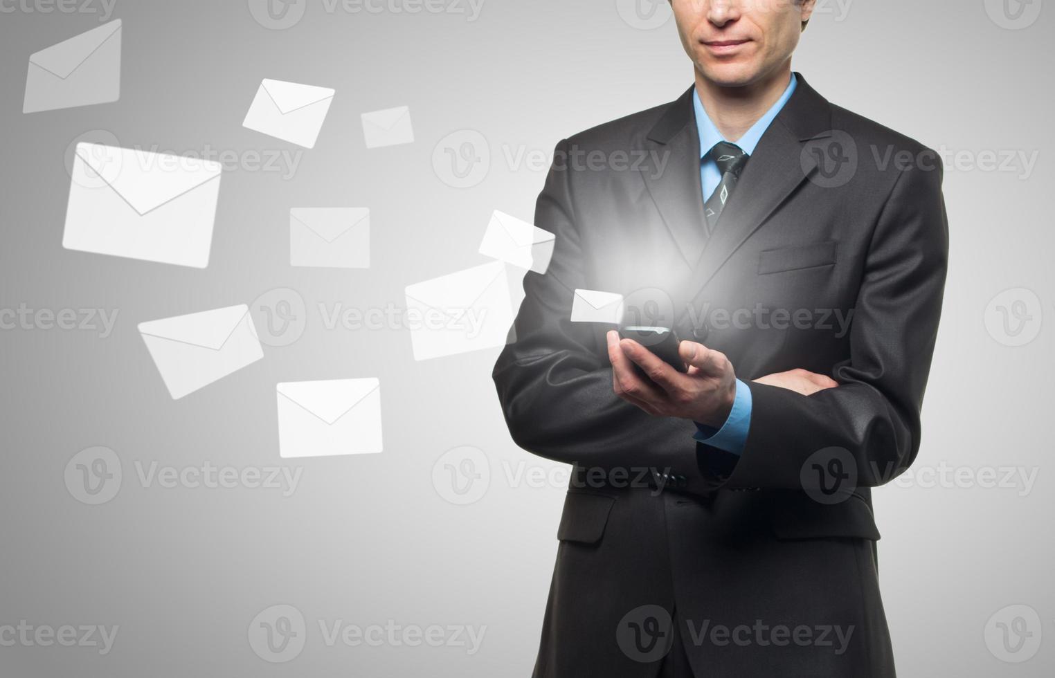 Businessman sends a virtual message photo