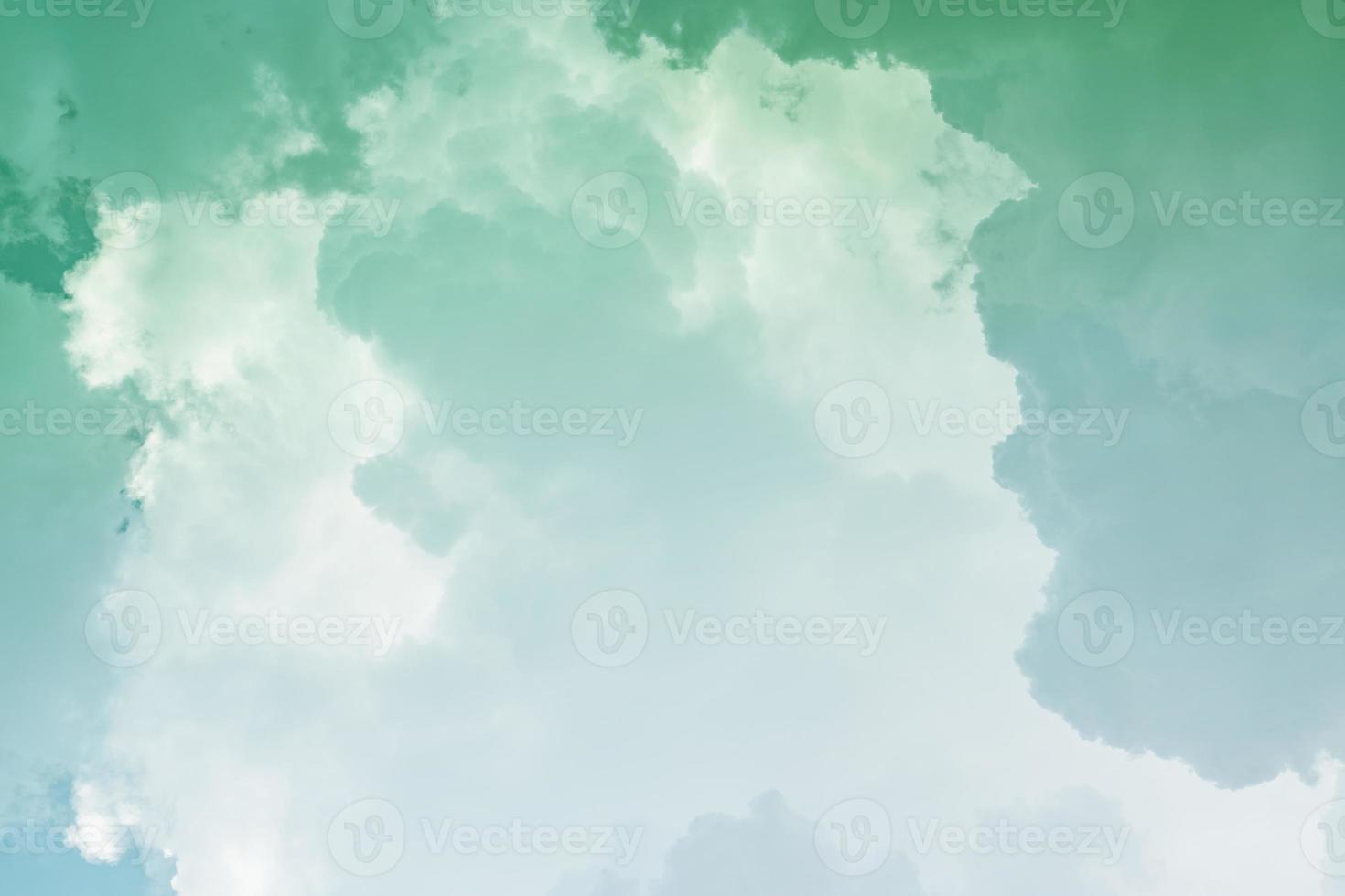 White cloud and green sky background with copy space photo