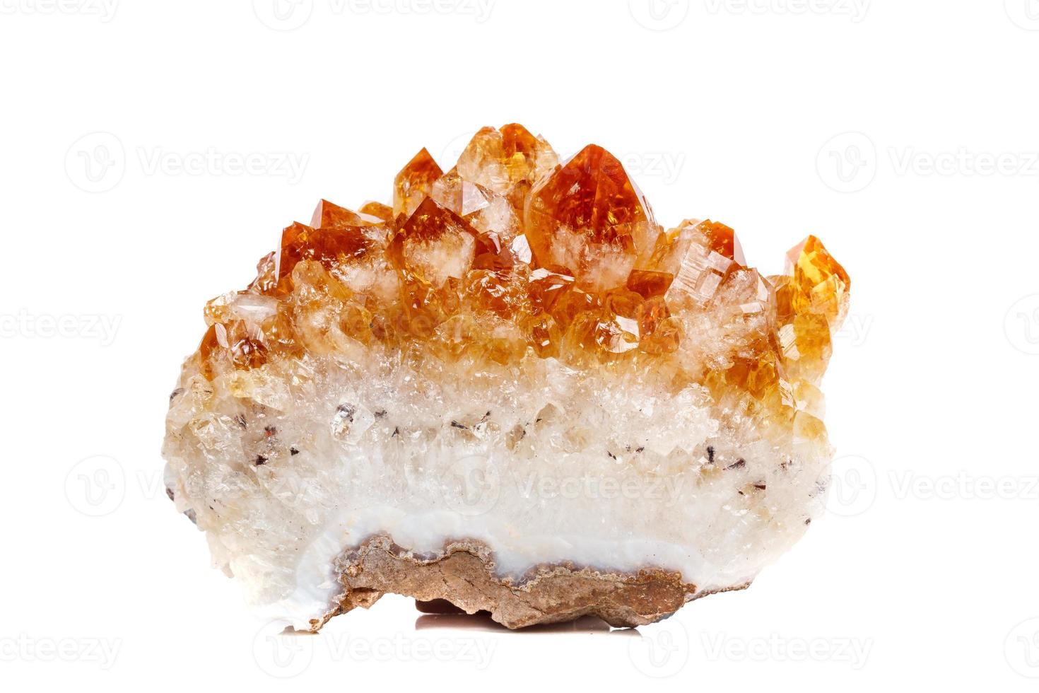 Macro mineral stone Citrine in rock in crystals on a white background photo