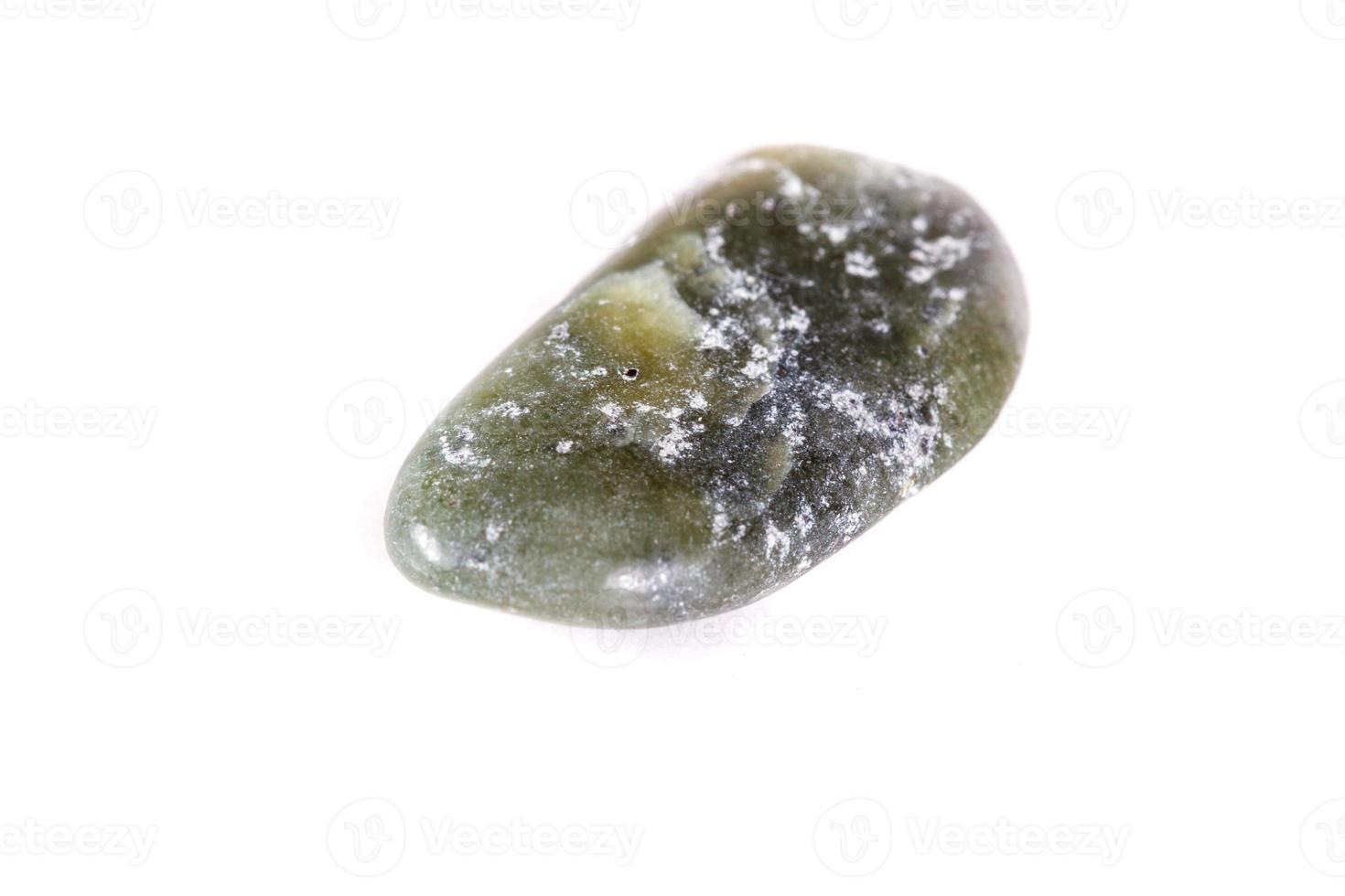 Macro mineral stone jasper on a white background photo