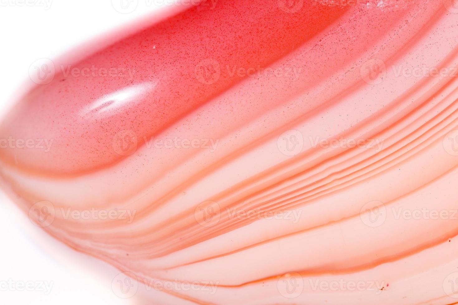 Macro mineral agate of Madagascar against white background photo