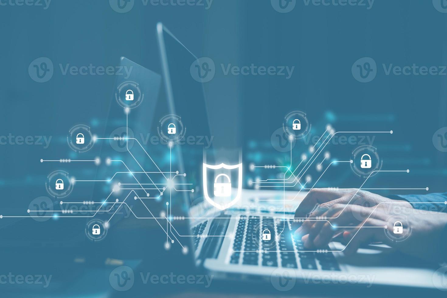 Cybersecurity and privacy concepts to protect data. Lock icon and internet network security technology. Businesswoman protecting personal data on laptop computer with virtual screen interfaces. photo