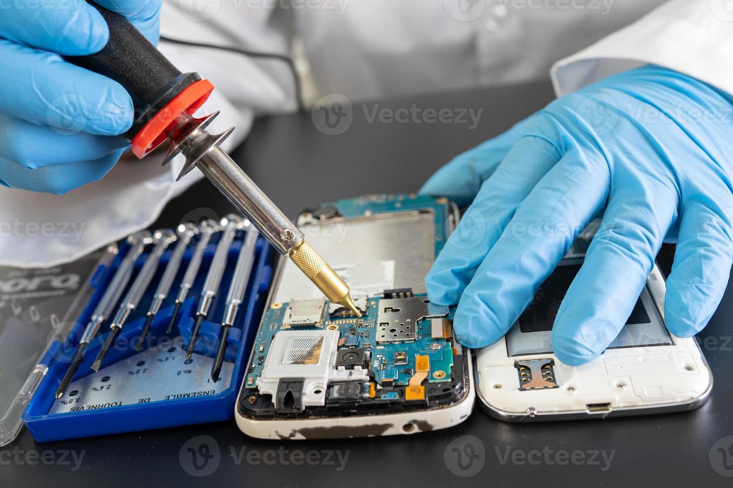 Repairing and upgrade mobile phone, electronic, computer hardware and technology concept. photo