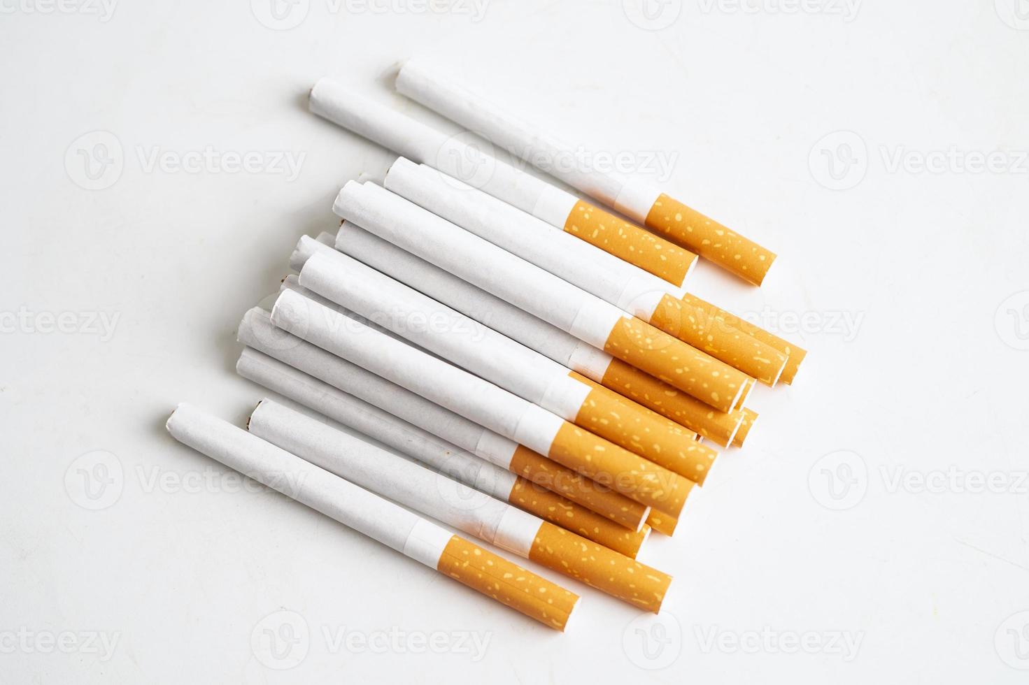 Cigarette, tobacco in roll paper with filter tube, No smoking concept. photo