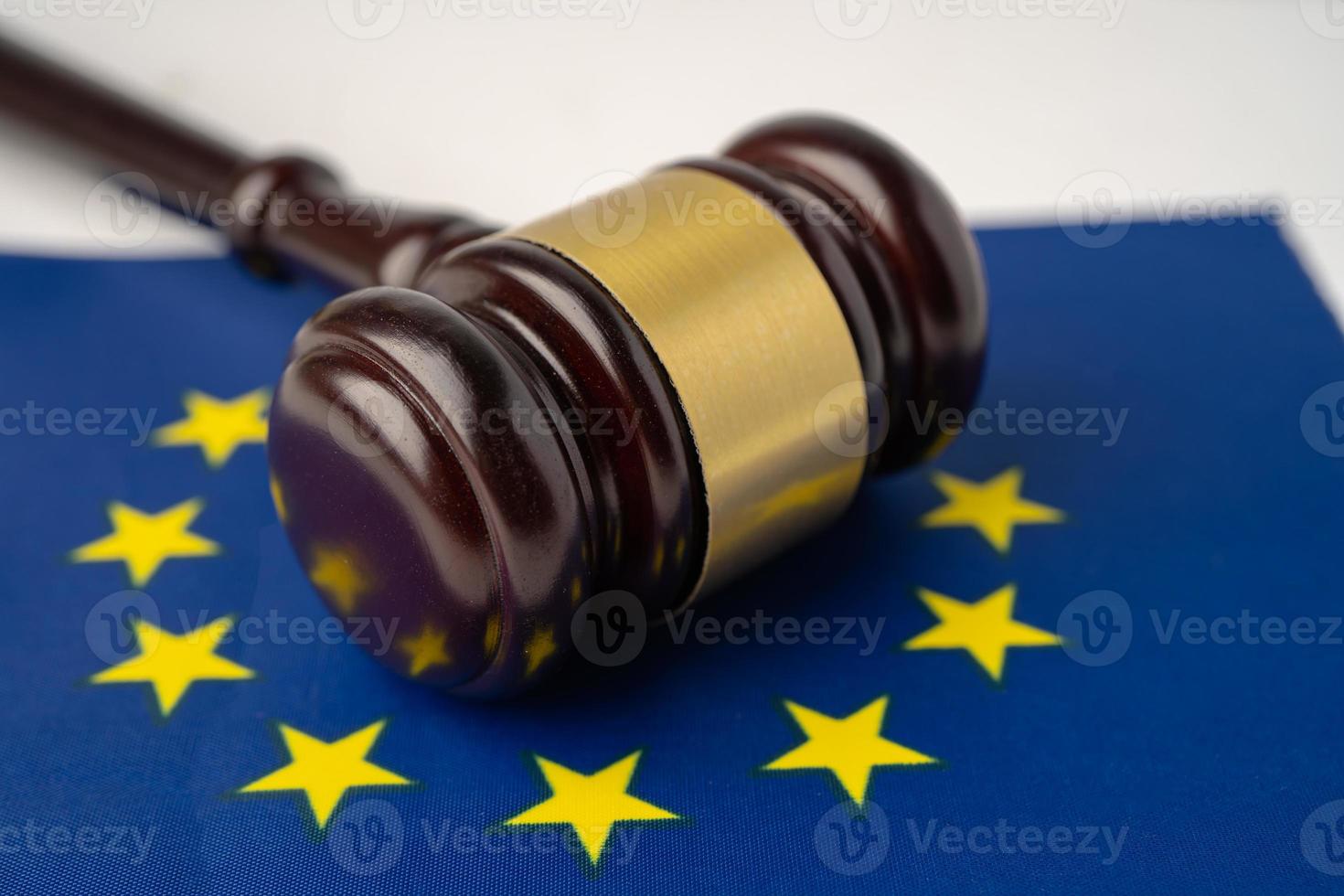 Gavel for judge lawyer on EU flag, finance concept. photo