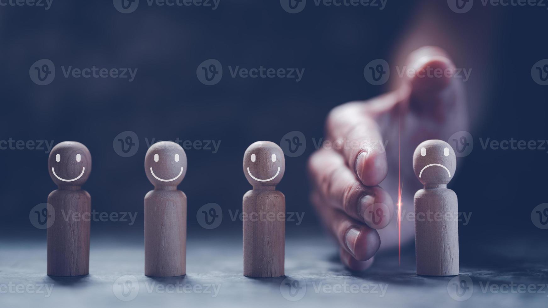risk management  concept, hand separating wooden people from group show how to manage the risk and conflict photo