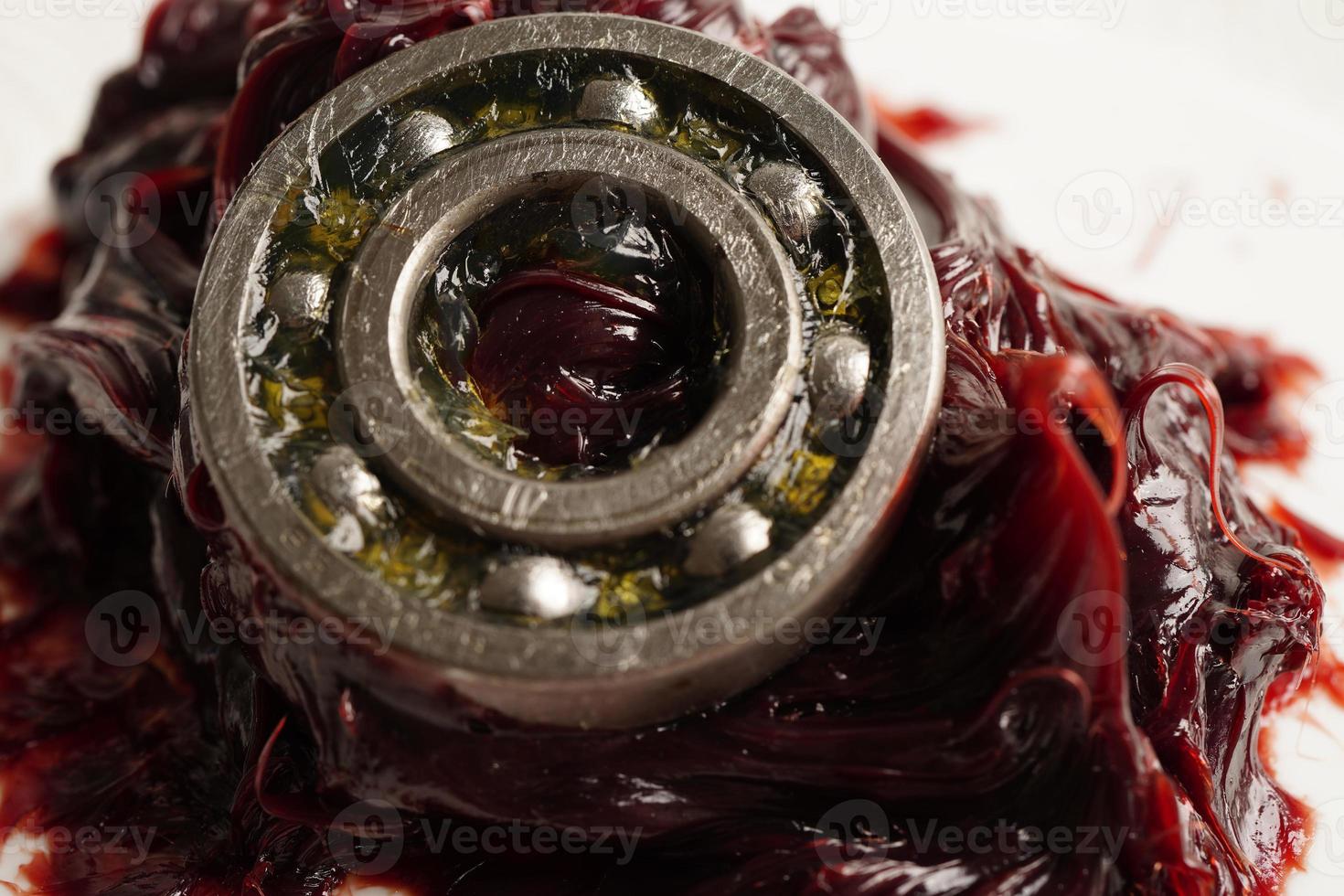Grease and ball bearing, red excellent water resistance synthetic lithium complex grease for moving path and machinery lubrication for automotive and industrial. photo
