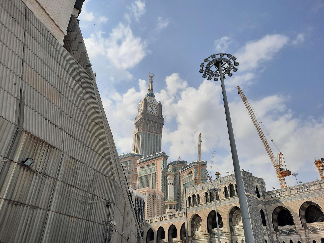 Mecca, Saudi Arabia, March 2023 - A beautiful daytime view of the Mecca Clock Tower in front of the Grand Mosque in Mecca, Saudi Arabia. photo