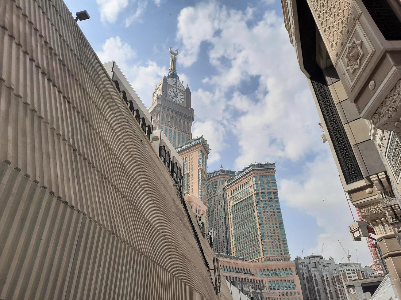 Mecca, Saudi Arabia, March 2023 - A beautiful daytime view of the Mecca Clock Tower in front of the Grand Mosque in Mecca, Saudi Arabia. photo