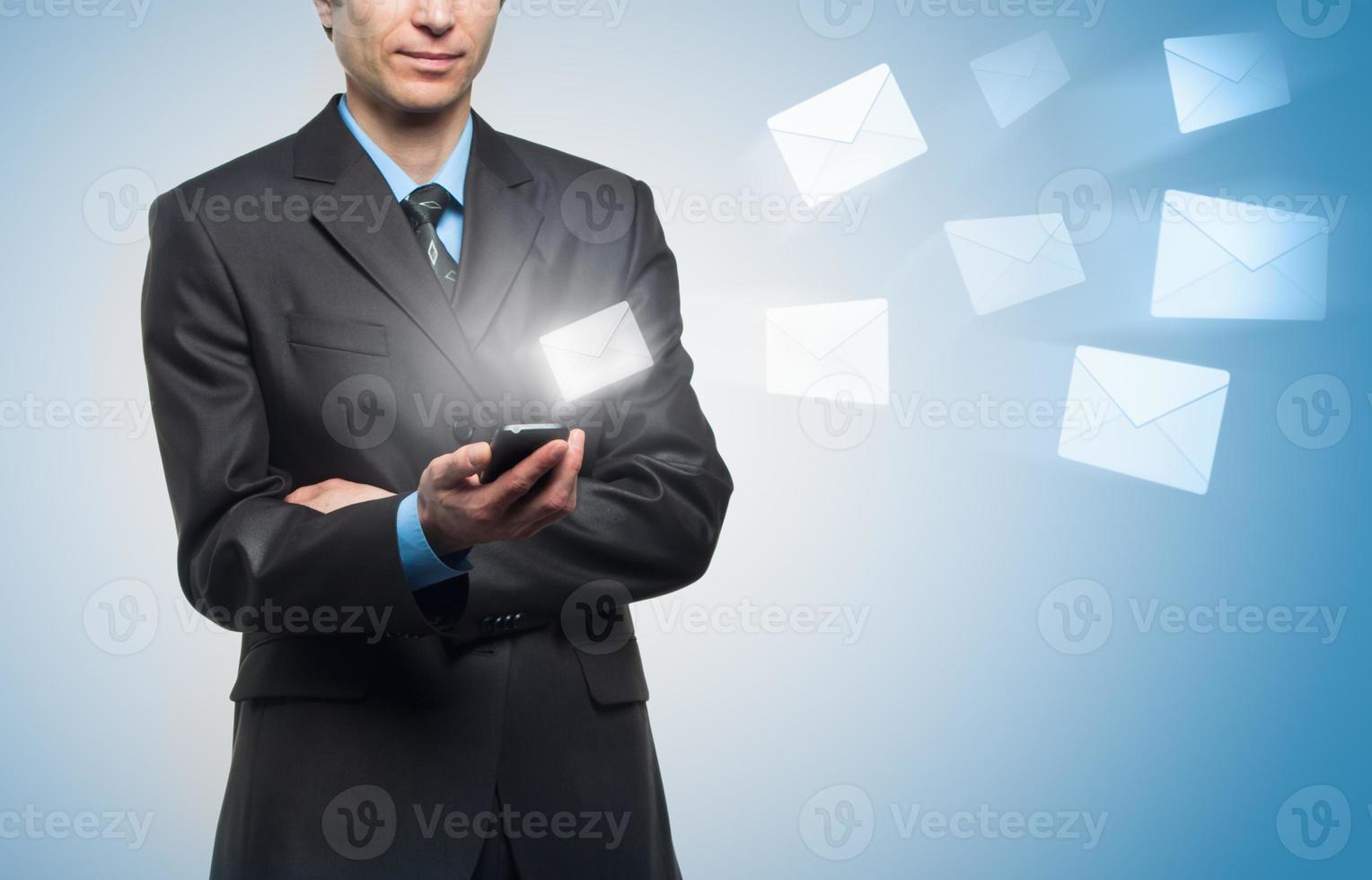 Businessman sends a virtual message photo