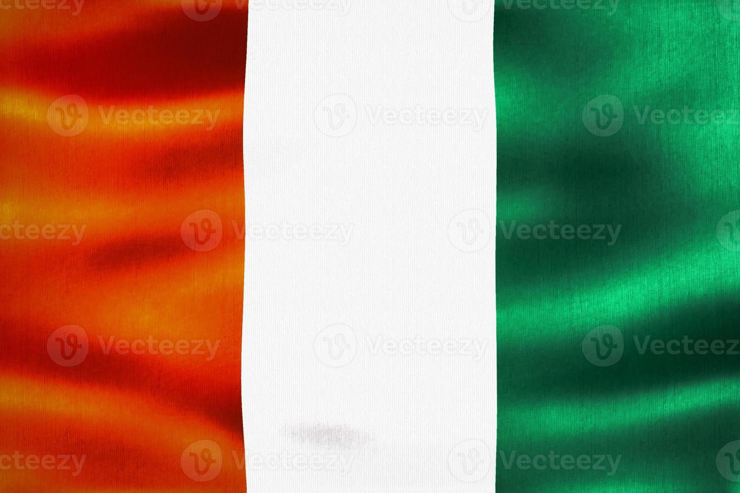 Ivory Coast flag - realistic waving fabric flag photo