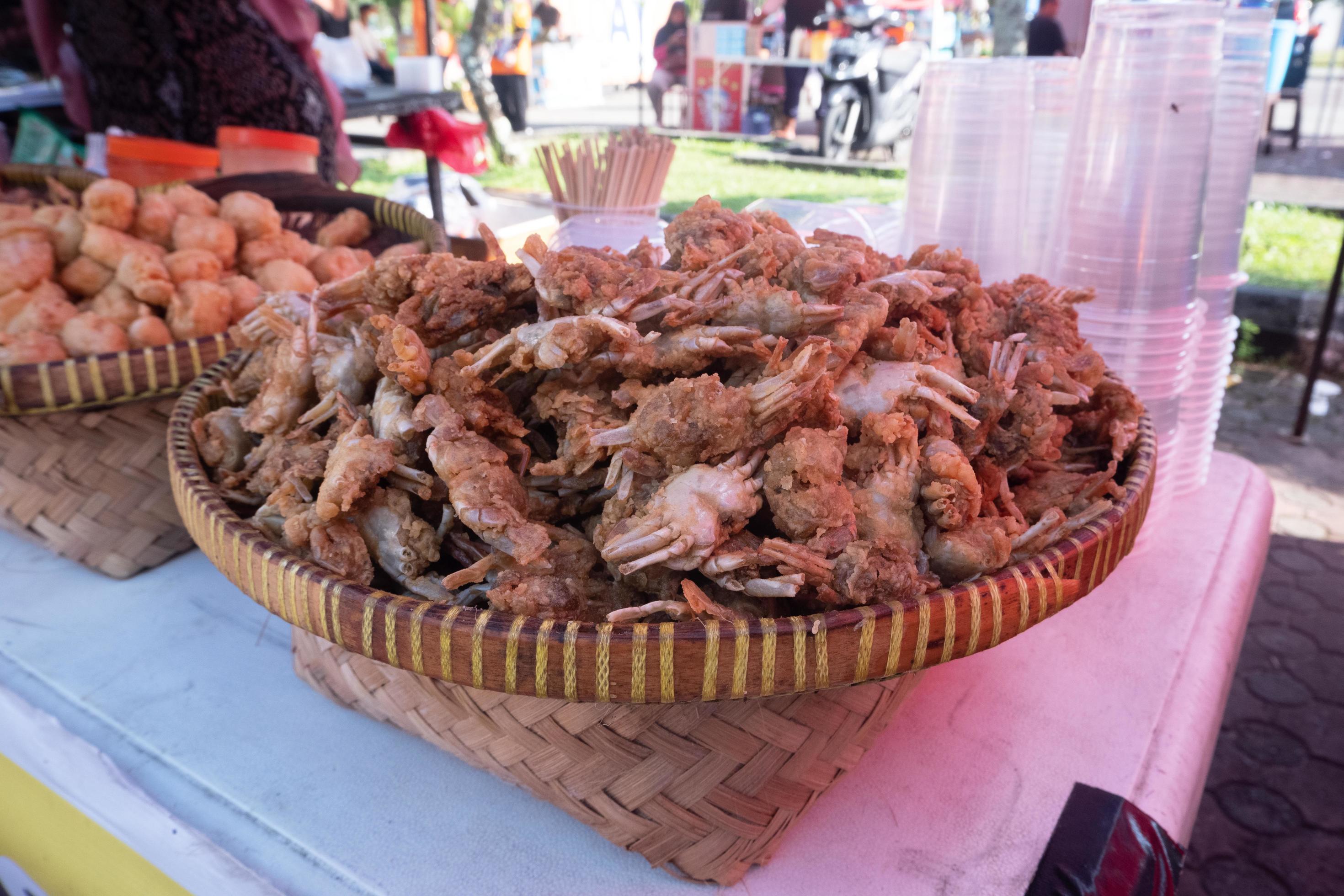 Crispy fried baby crab snacks sold at culinary festivals 21074355 Stock
