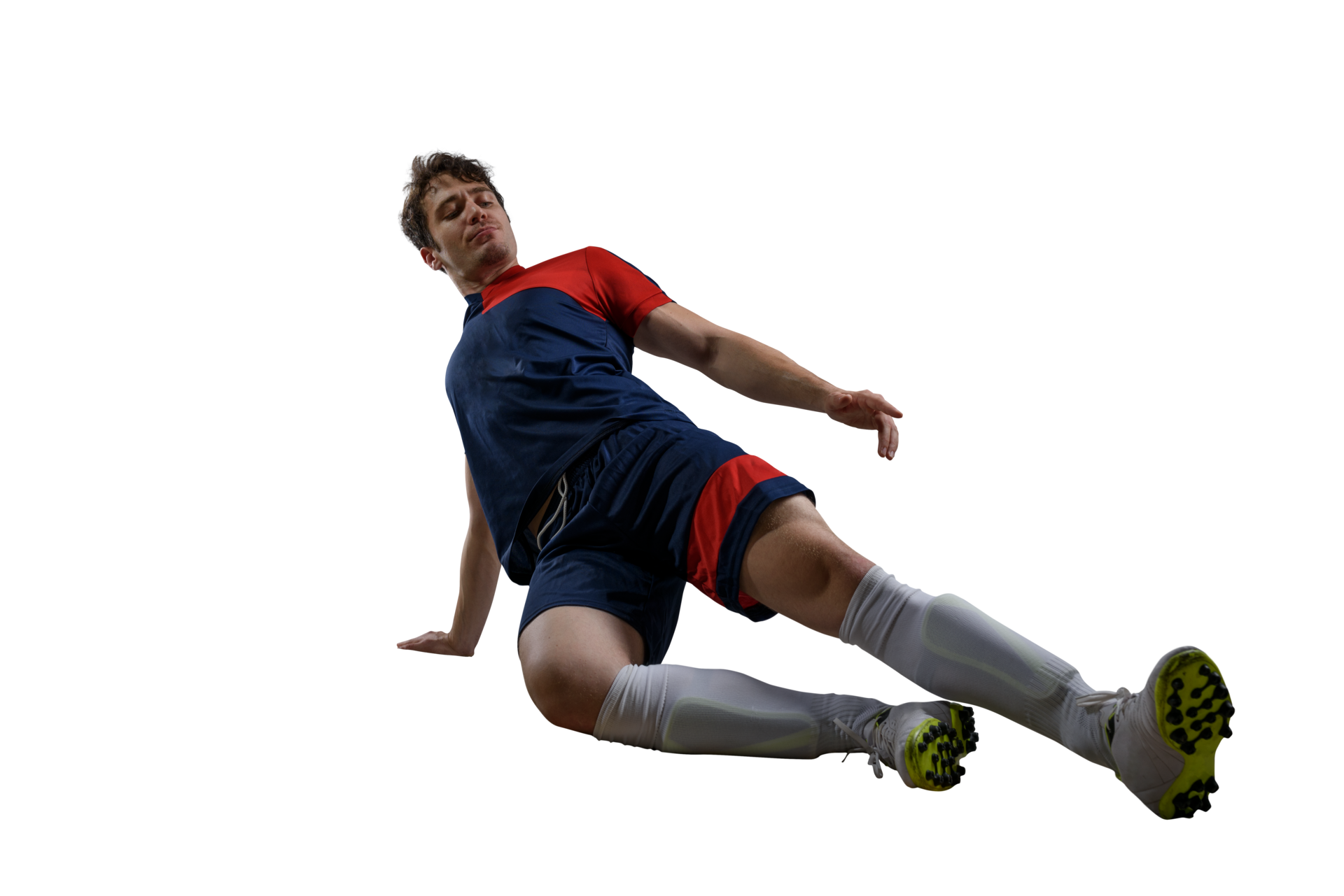 Football player slides to hinder the opponent soccer player during the