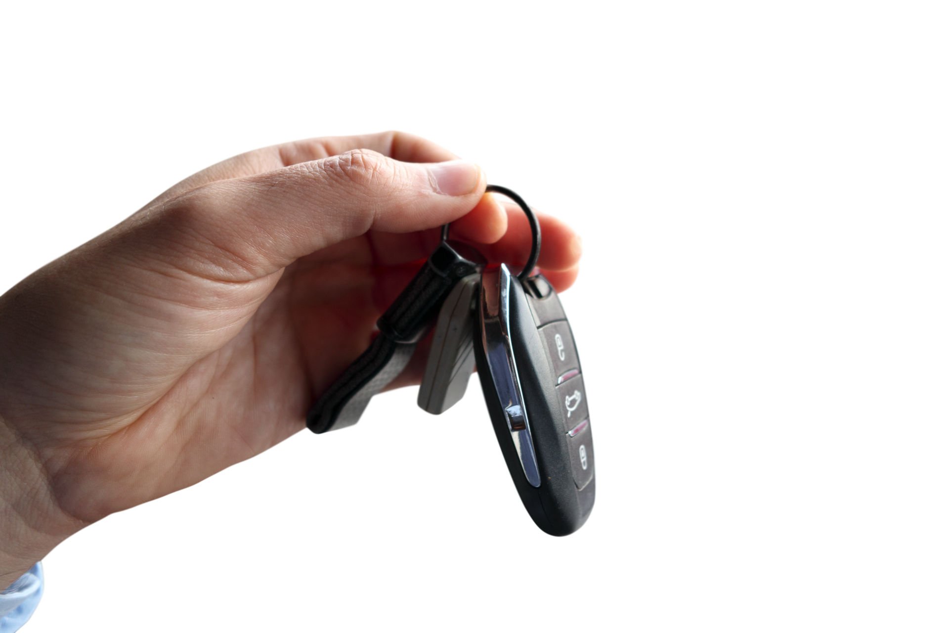 Hand holds a car keys with central locking 21081744 PNG