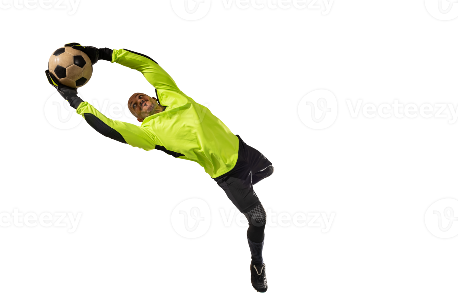 Goalkeeper catches the soccer ball during a football match 21085064 PNG