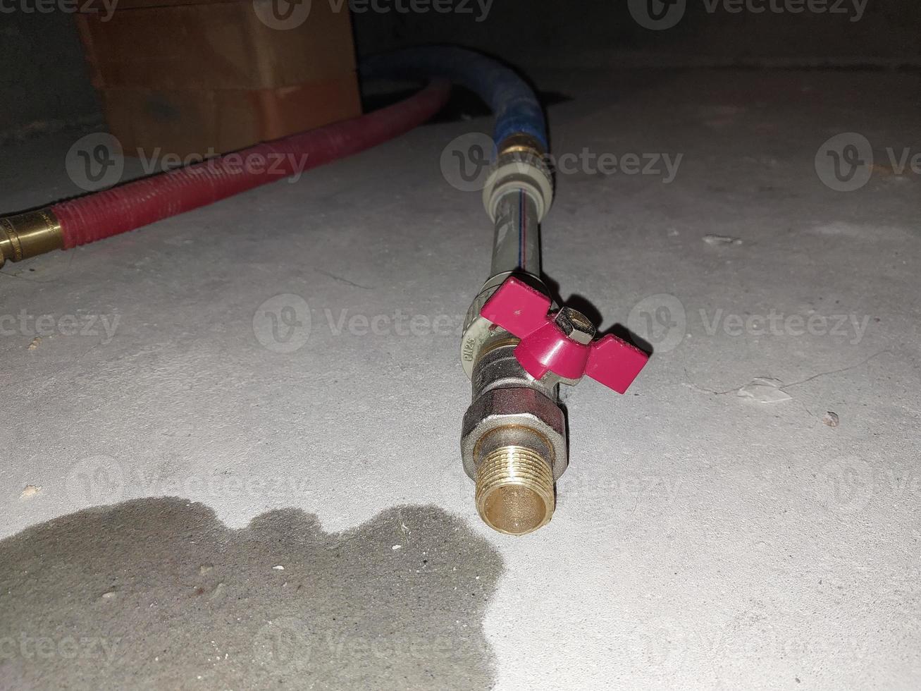 Installation of plumbing in a new apartment photo
