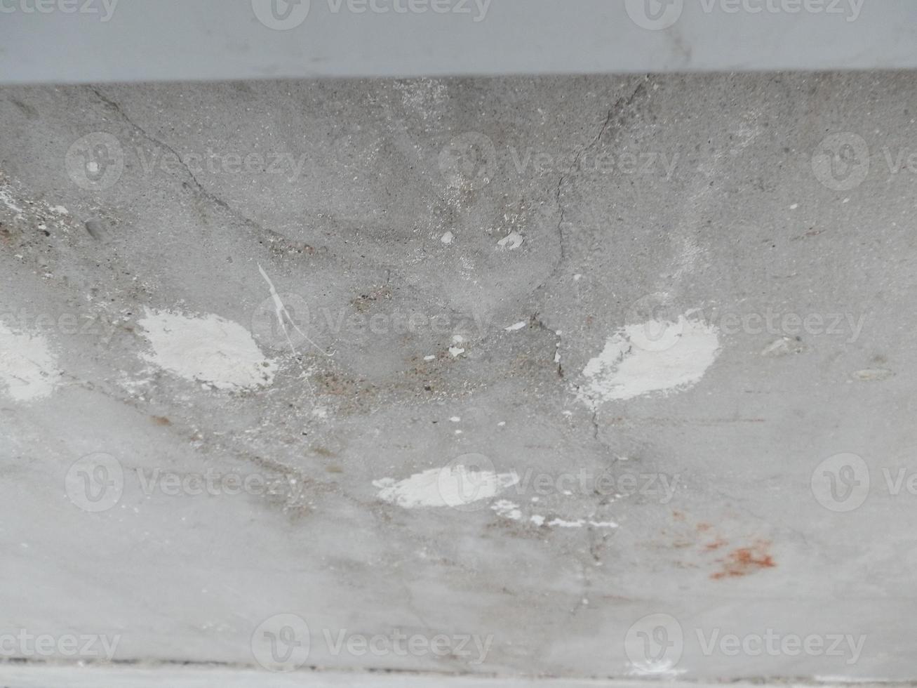 Old cracked balcony railing slab in need of repair photo