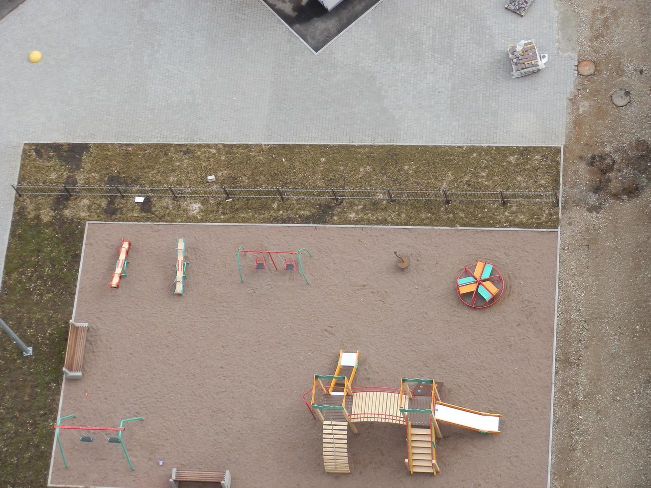 KYIV, UKRAINE - March 9, 2023 Top view of a multi-storey residential building on the ground photo