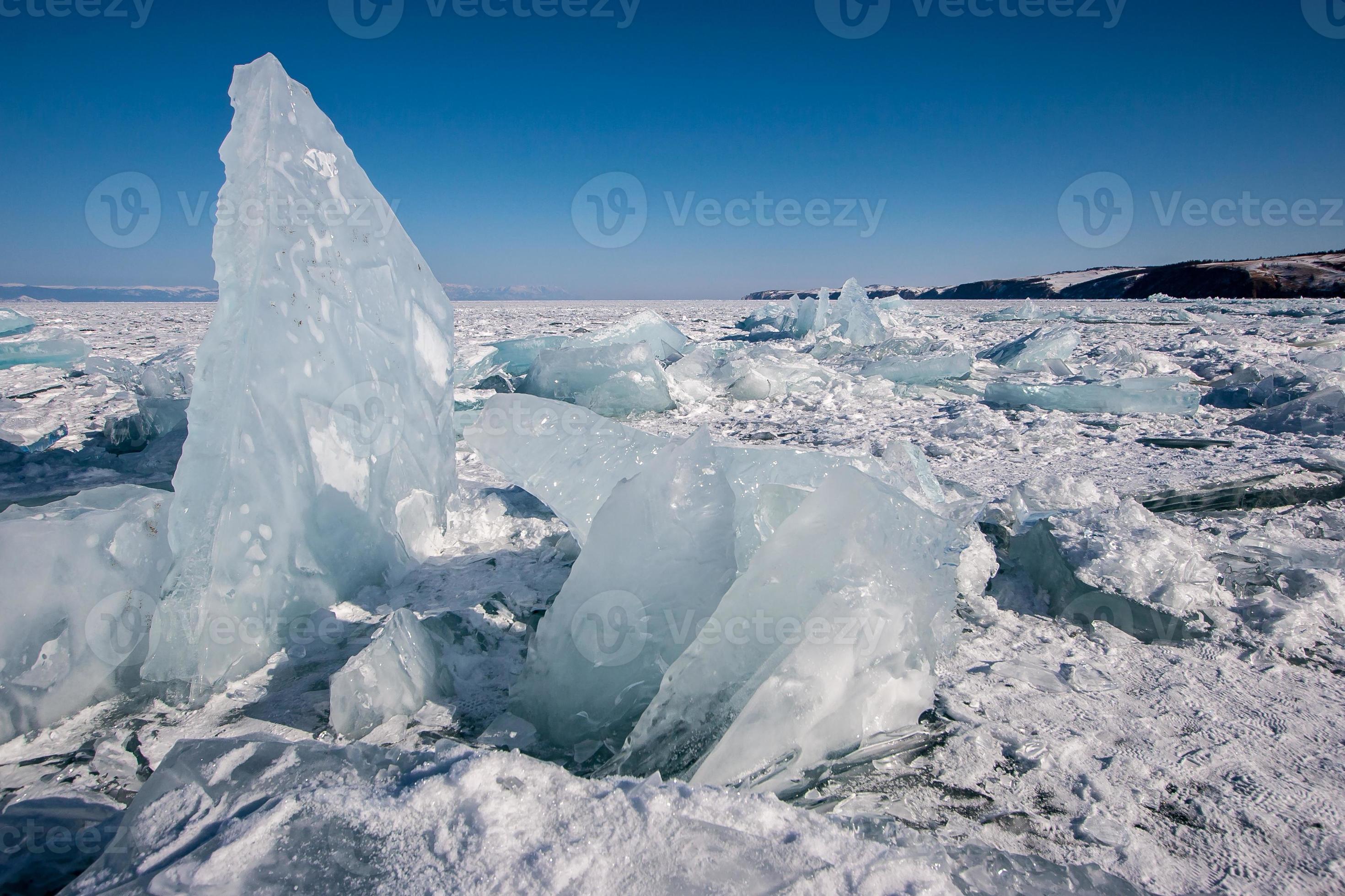 A large piece of ice stands vertically frozen into Lake Baikal