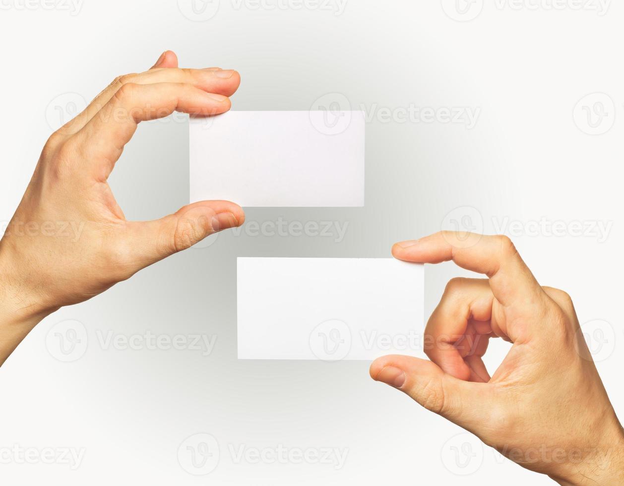 Business card in hands photo