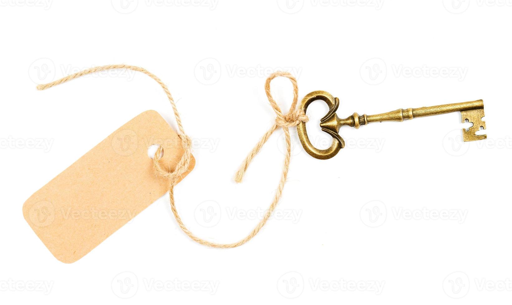 Vintage key with a tag for the text photo