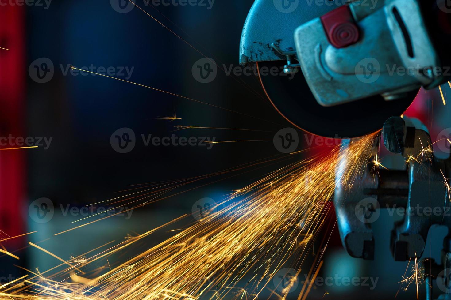 Angular grinding machine is cutting the metal photo