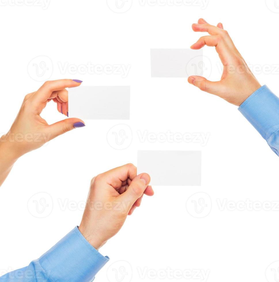 Business cards in hands photo