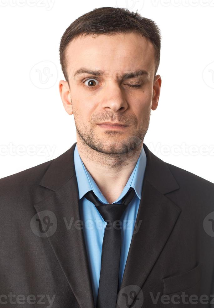 Winking businessman portrait photo