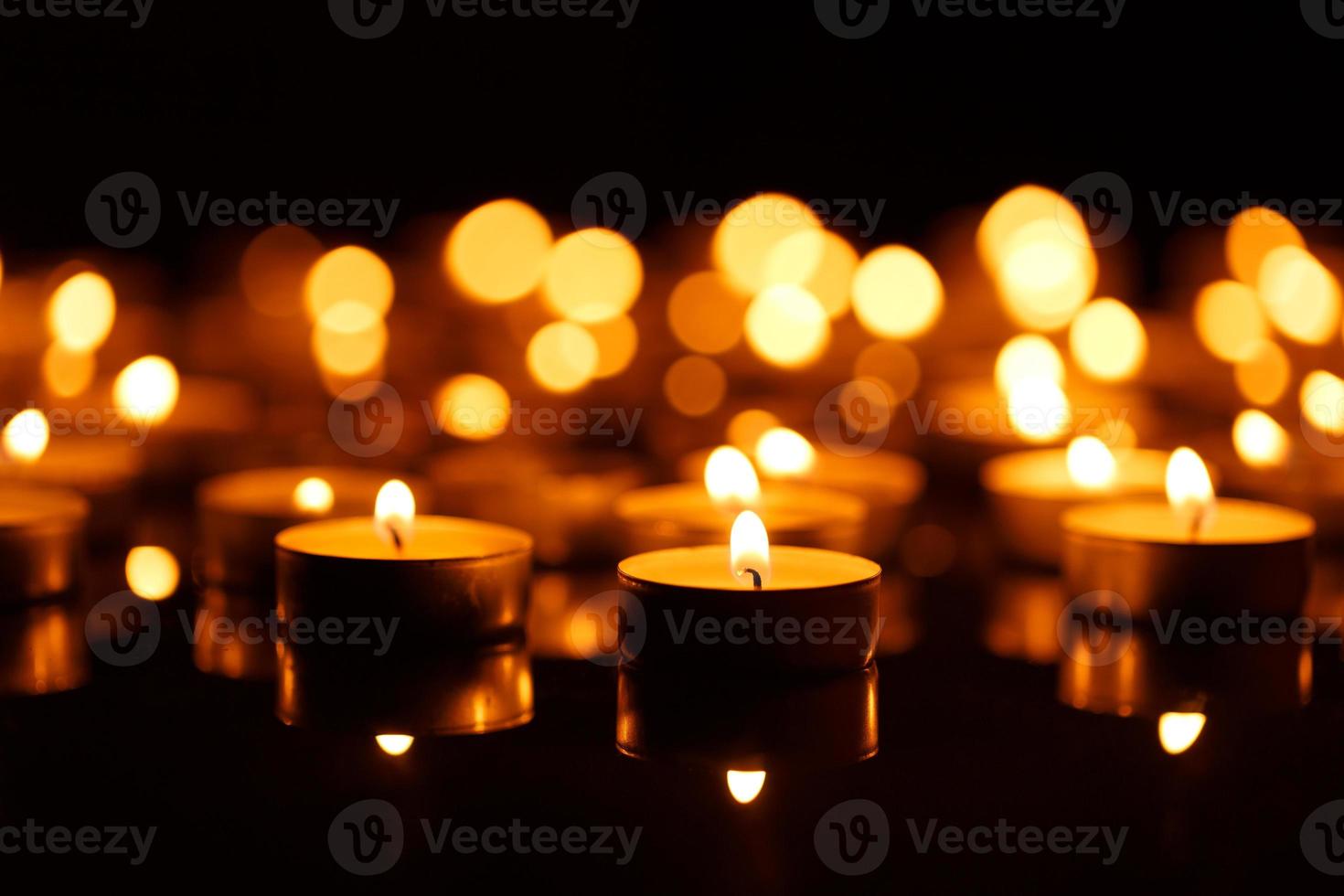 Burning candles with shallow depth of field photo