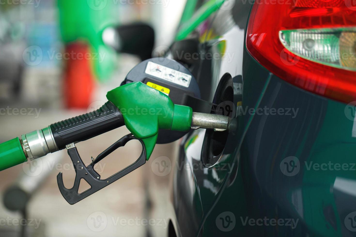 Car refueling on a petrol station in winter photo