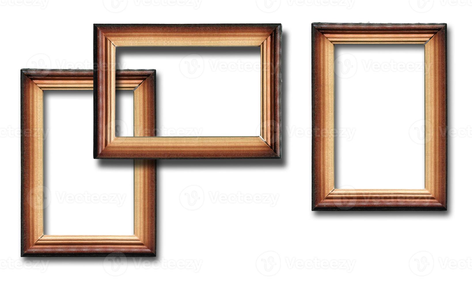 Wooden frames with shadow on white background photo