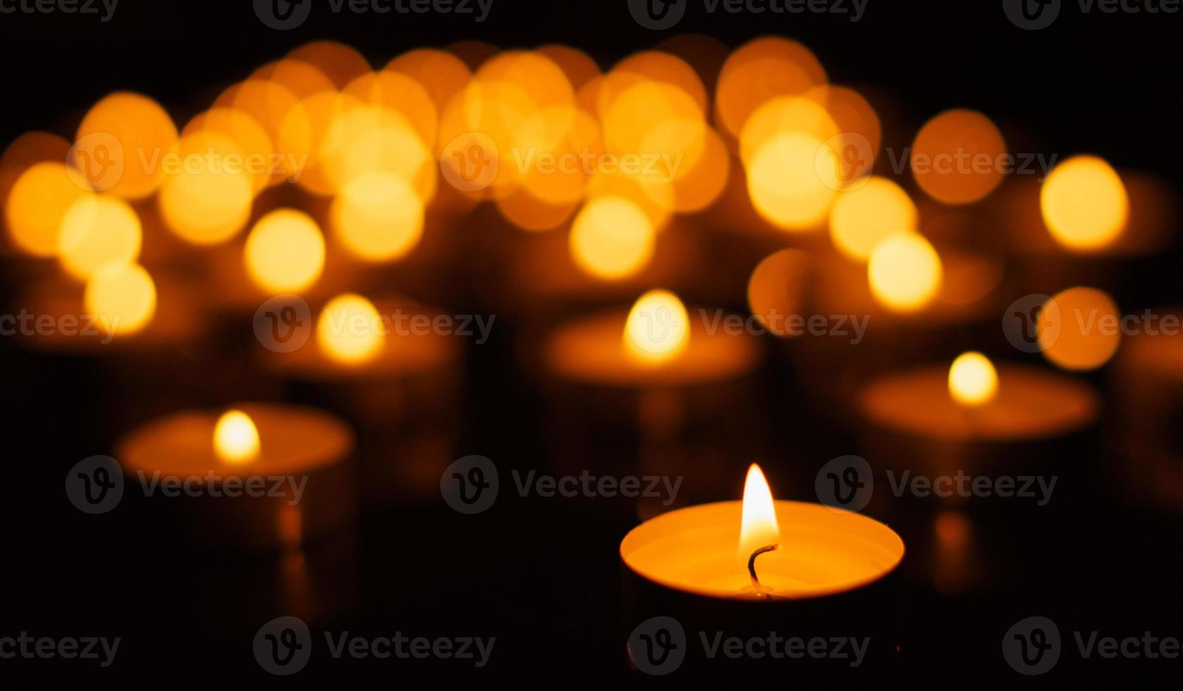 Burning candles with shallow depth of field photo