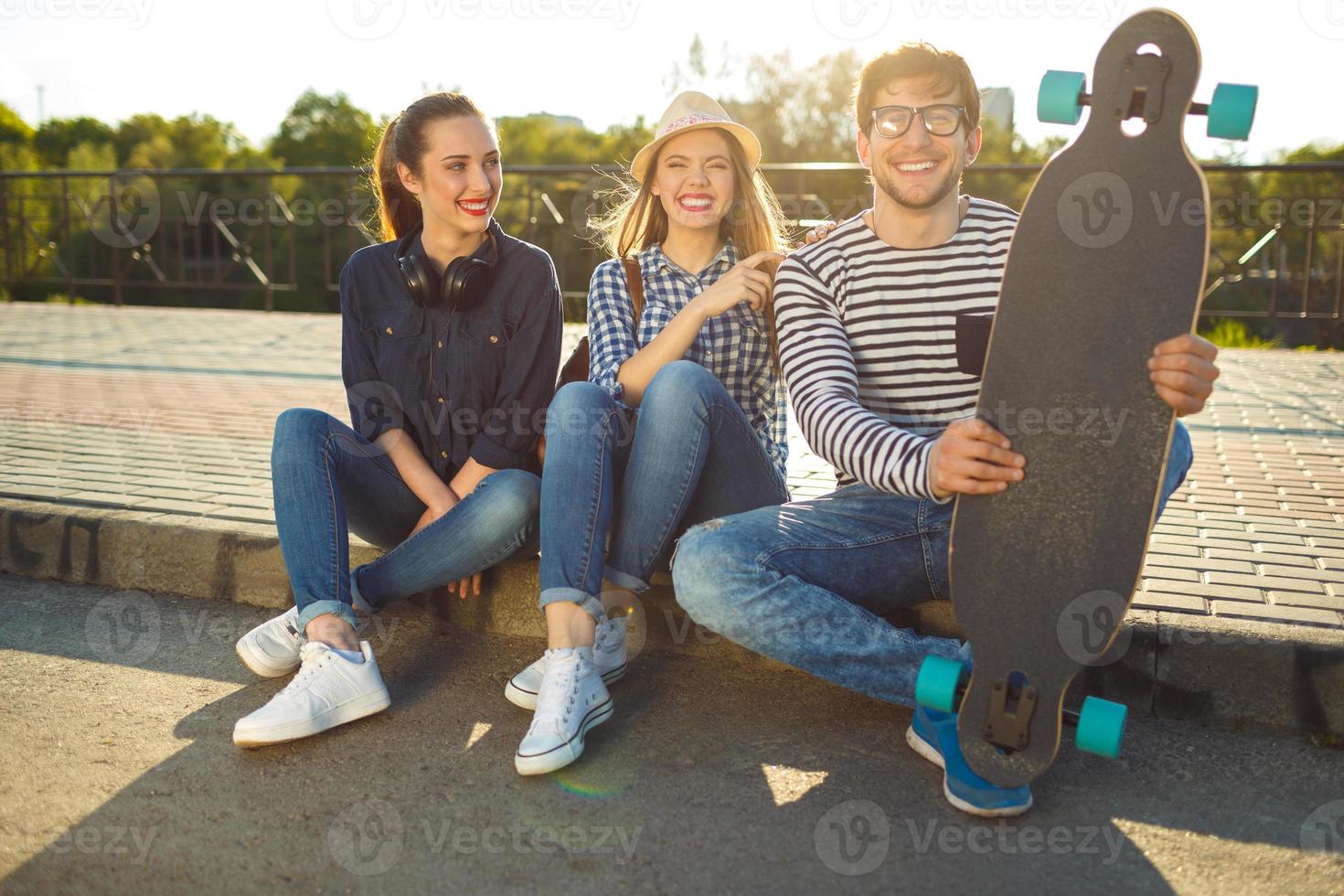 Smiling friends having fun outdoors photo