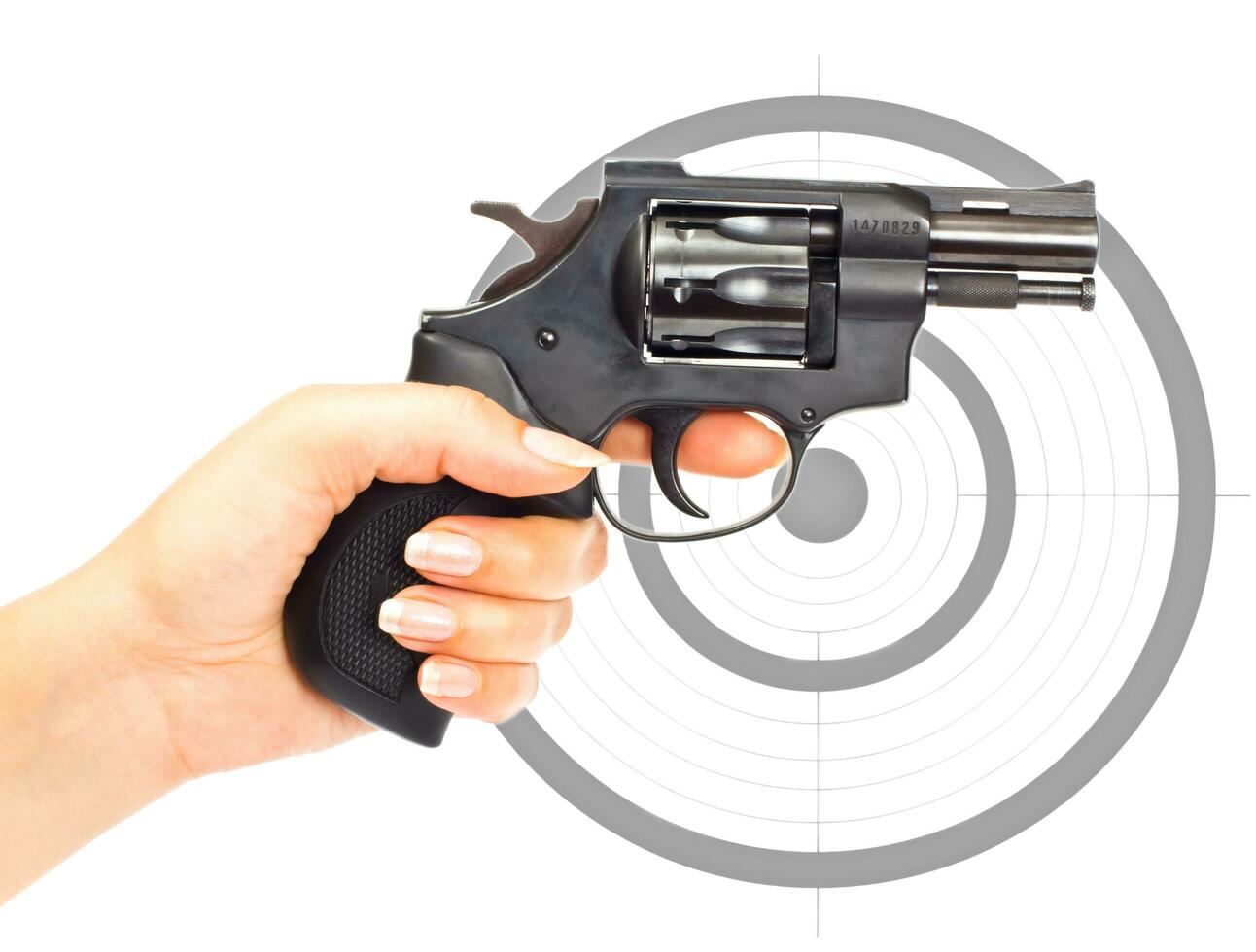 Hand with gun and target photo