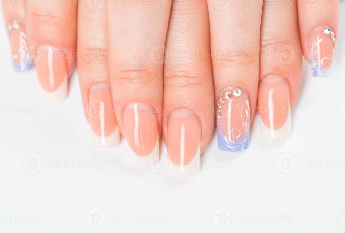 Beautiful female hands with french manicure photo