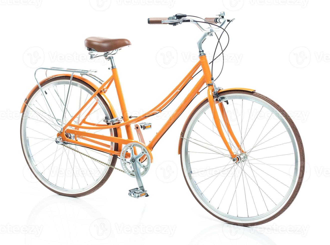 Stylish womens orange bicycle isolated on white photo