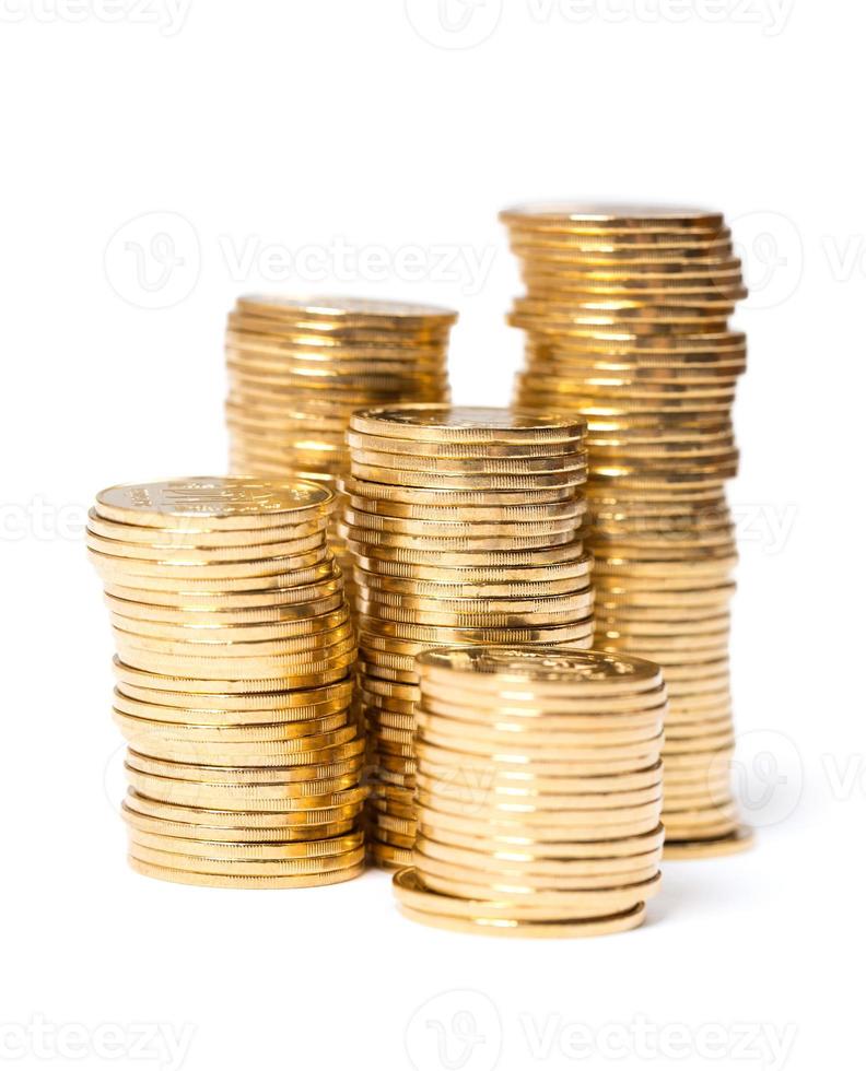 Coins columns on white background photo