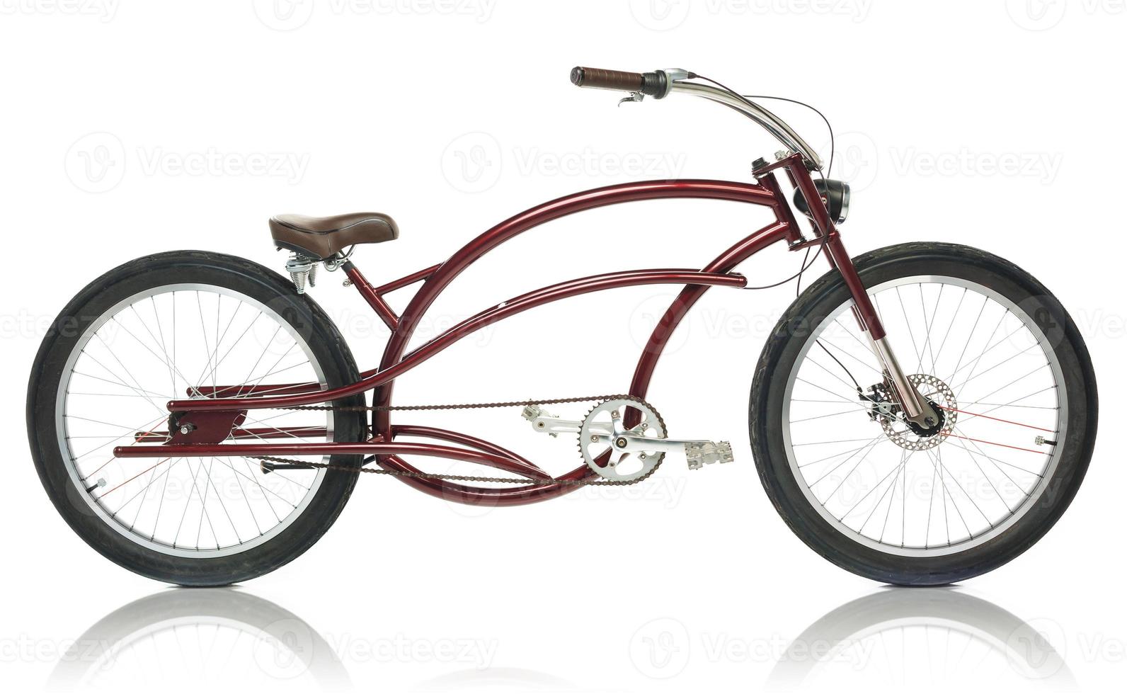 Retro styled brown bicycle isolated on a white photo