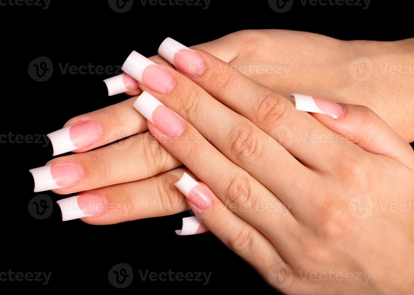 Beautiful hands with french manicure photo