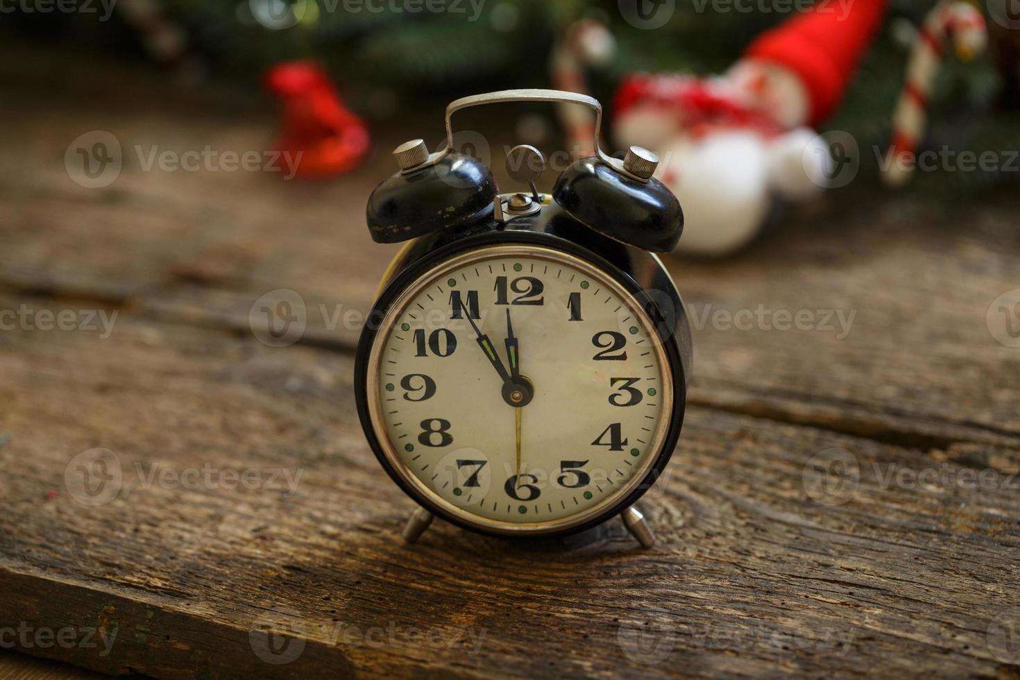 Vintage clock on christmas background photo
