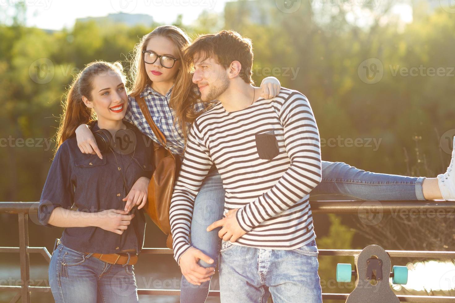 Smiling friends having fun outdoors photo