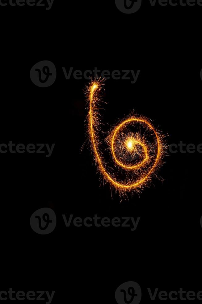 made with sAlphabet element made with sparklers ready for your inscriptions on black background photo
